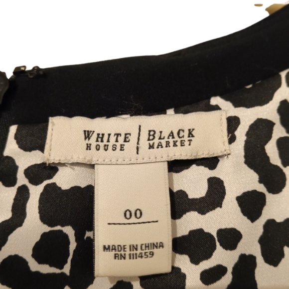 🎁 WHBM Vintage LBD. Has Pleating on Bust Area, Wide Waistband, Front Side Slit - Picture 11 of 12